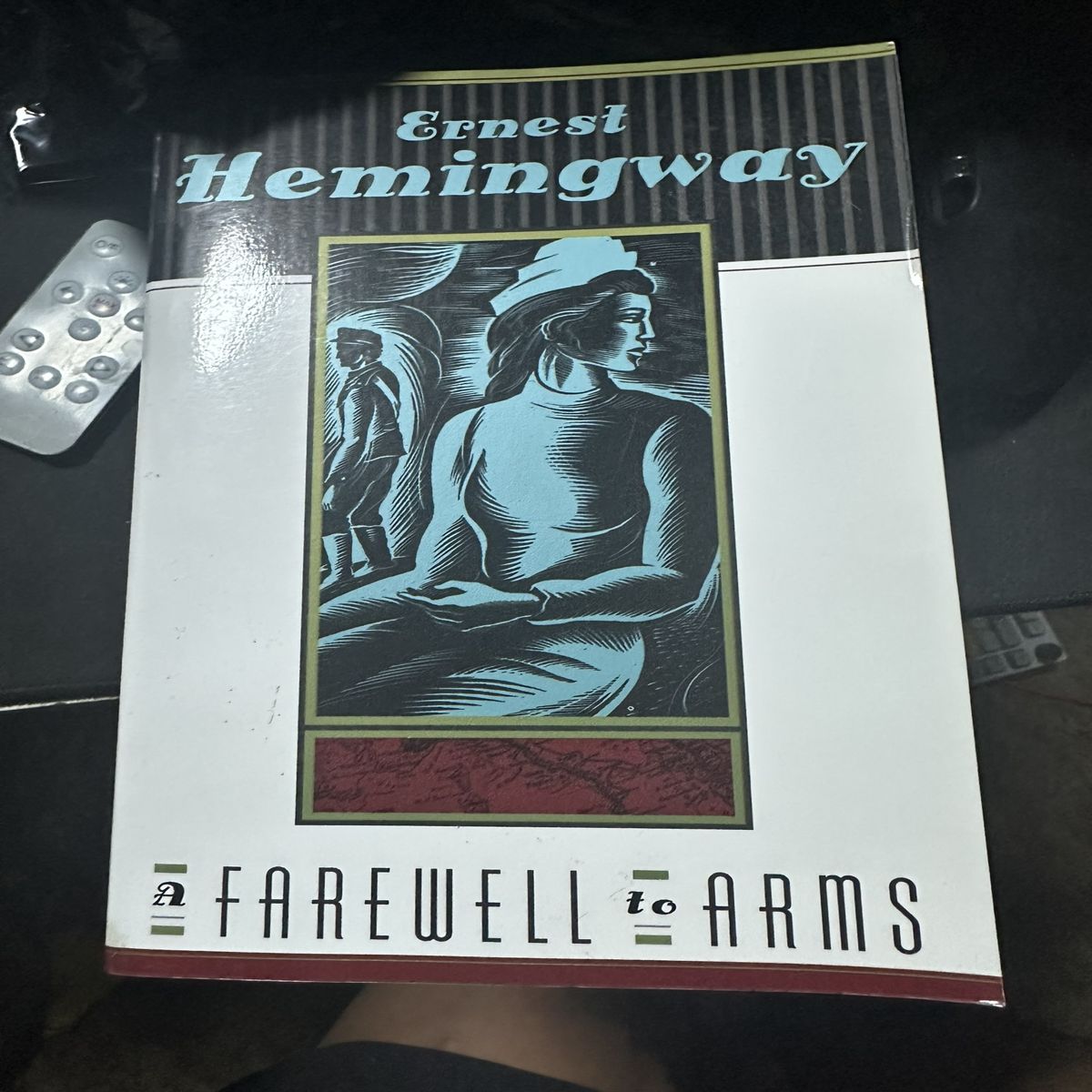 “Monochrome Elegance: A Farewell to Arms by Hemingway”