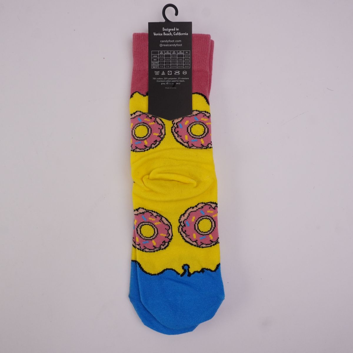 “Donut Delight: Vibrant Pink & Yellow Quirky Socks”